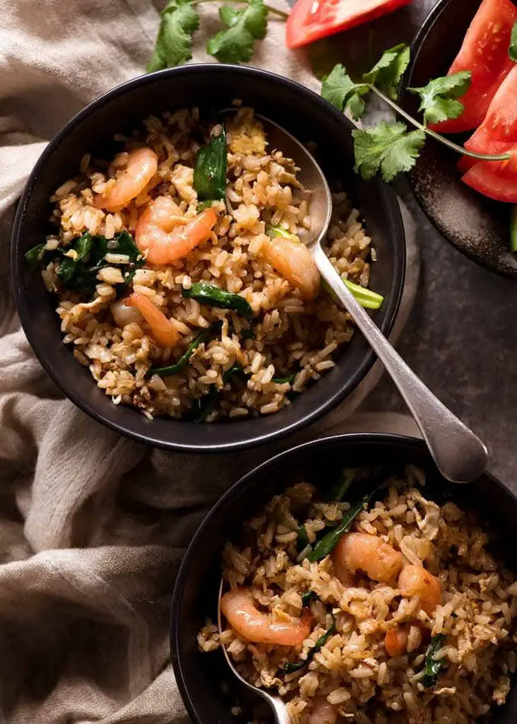 Two bowls of Thai Fried Rice, ready to be eaten